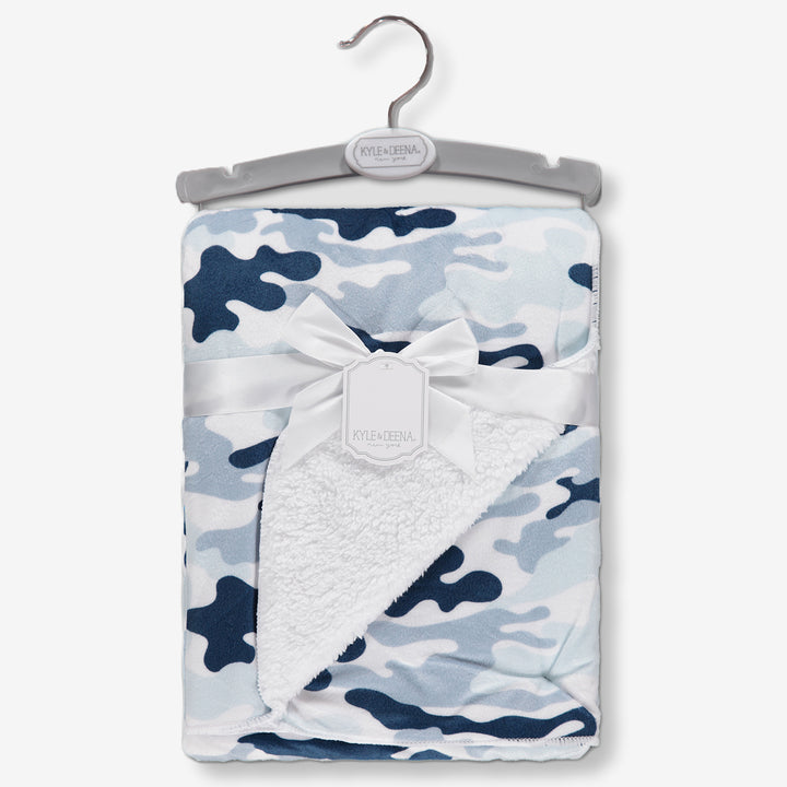 Baby blanket blue camo shown for retail with blanket